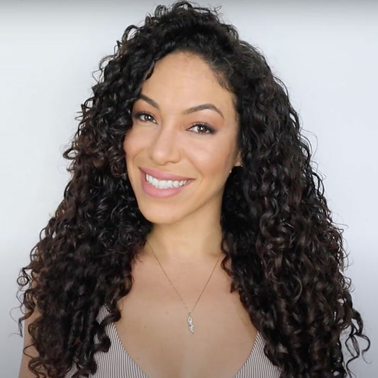 How to clip in and blend curly clip in hair extensions.