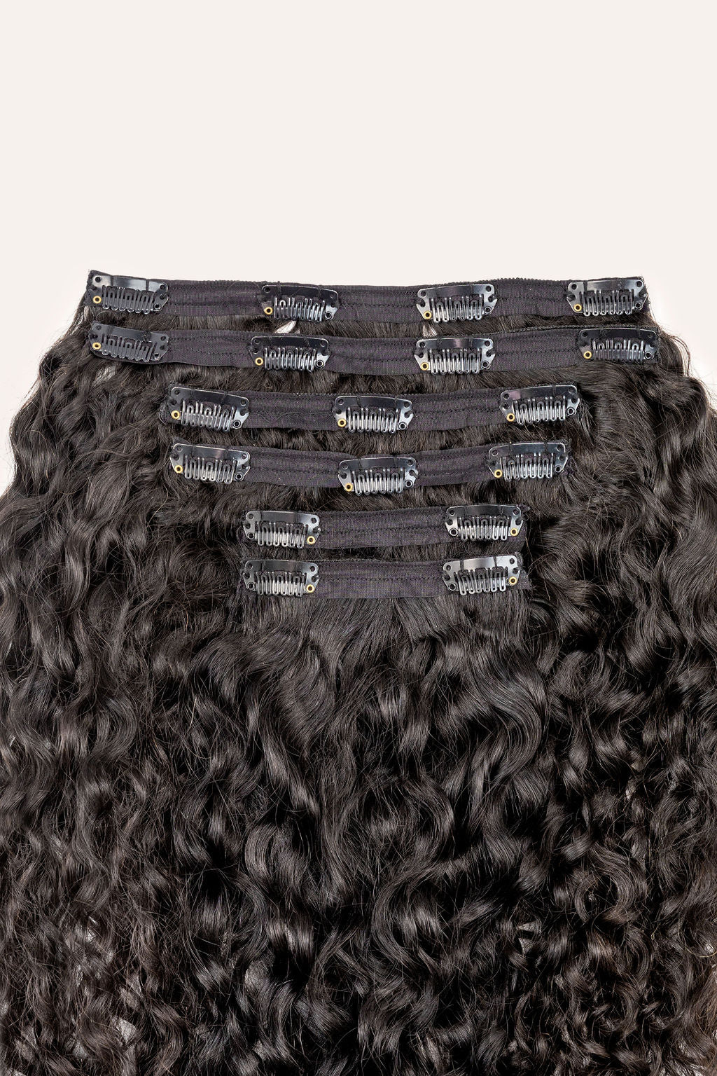 Jet Black Curly Clip-In Hair Extensions